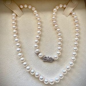 Mikimoto 22" pearl necklace w/ diamond clasp